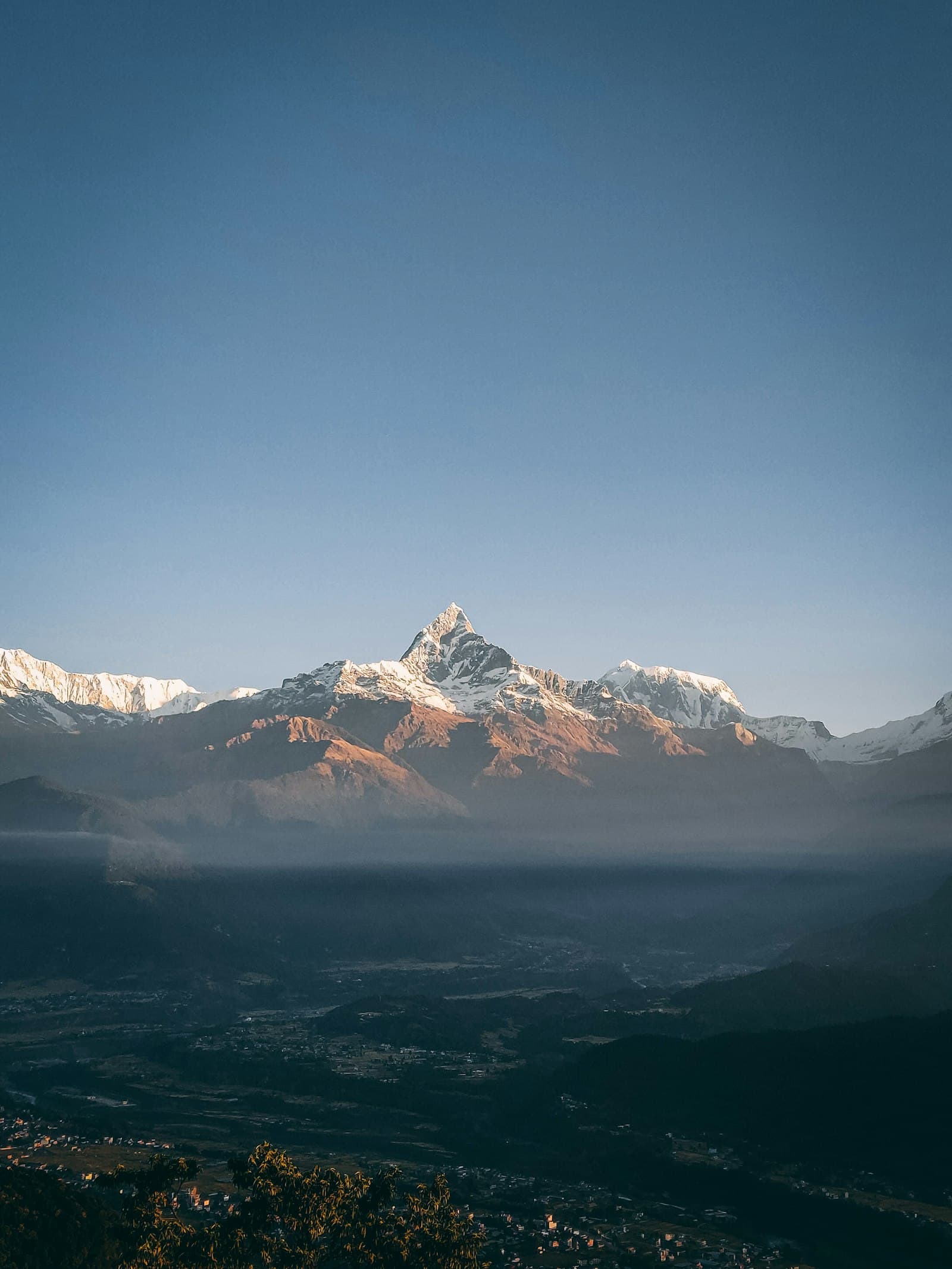 First light on Machhapuchhre and the Annapurna range at sunrise